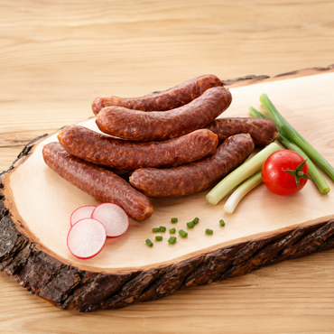 Original Kitzbüheler Beisserl über Buchenholz geräuchert und an Tiroler Bergluft gereift. Kleine Kaminwurzn aus Tirol